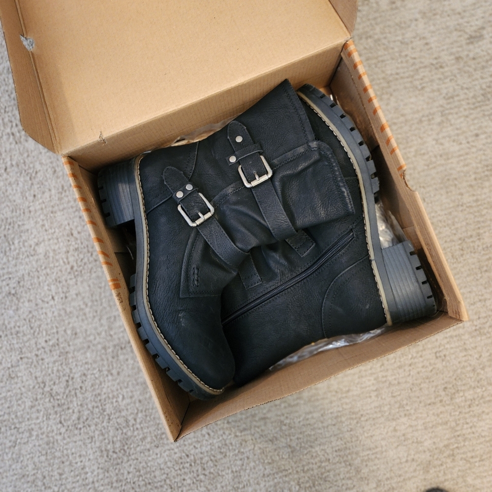 Black buckle boots
